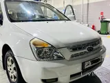 Kia Carnival 2010 – White | Slightly Negotiable (Only Watsapp)